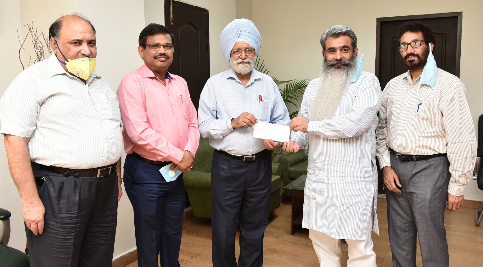 VC PAU hands over cheque of Rs.72.56 lakh on behalf of PAU staff for CM Covid 19 relief fund