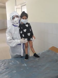 Mother’s day: brave heart mother tending her corona positive 2 years daughter donning complete PPE kit