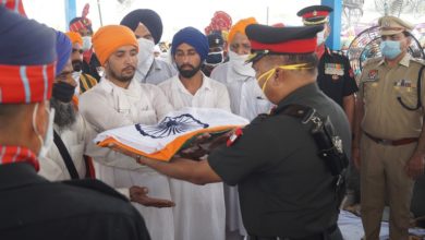 22 years old martyr Sepoy Gurtej Singh cremated with full honours ; father lit the pyre