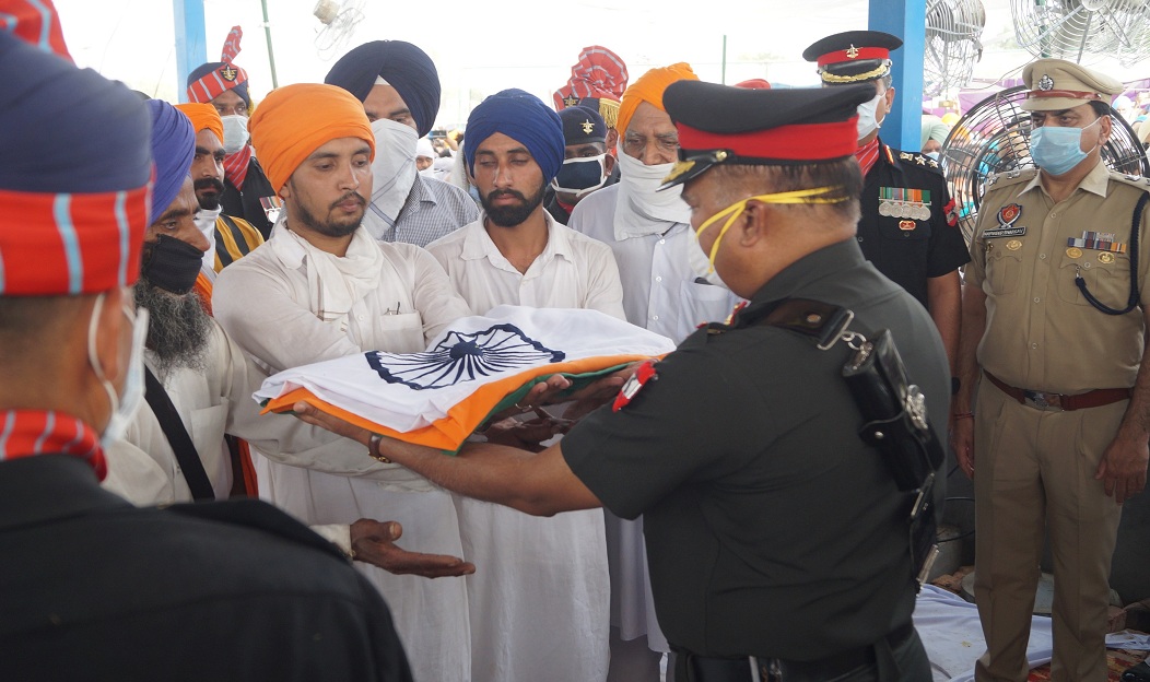 22 years old martyr Sepoy Gurtej Singh cremated with full honours ; father lit the pyre