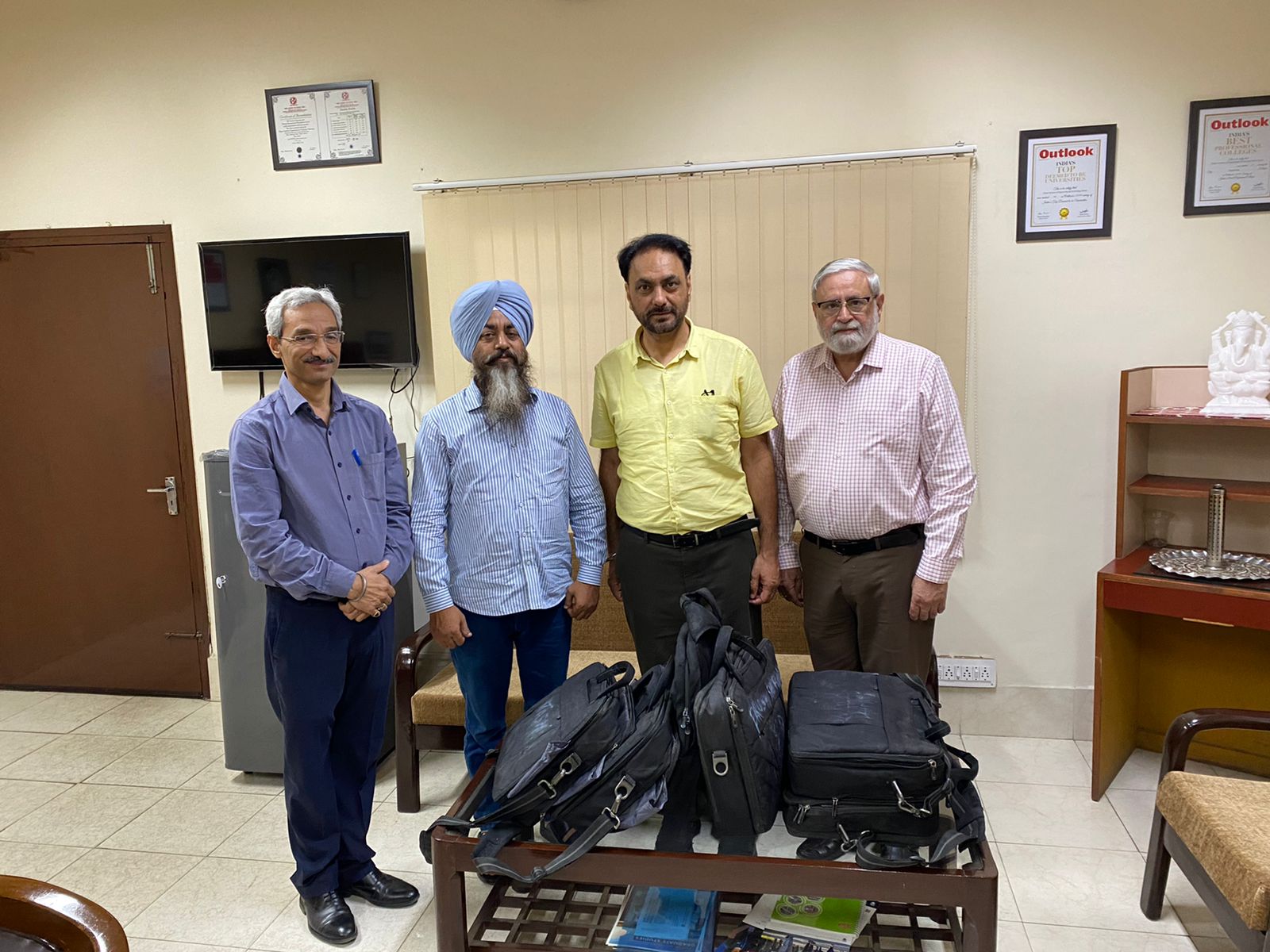 Noble gesture-Thapar Institute donated six laptops to BN Khalsa School Mall Road Patiala