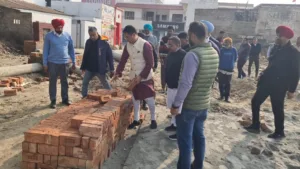 During surprise inspection of development works minister takes strict notice of use of old bricks in construction 