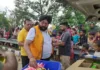 Members of Lions Club Patiala Classic distributed dry ration to flood victims