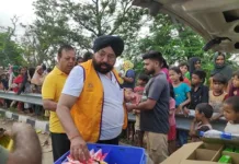 Members of Lions Club Patiala Classic distributed dry ration to flood victims