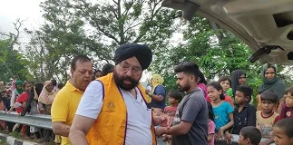 Members of Lions Club Patiala Classic distributed dry ration to flood victims