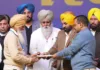 Mann, Kejriwal hands over cheque worth Rs 1 crore as financial assistance to family of martyr Amrik Singh