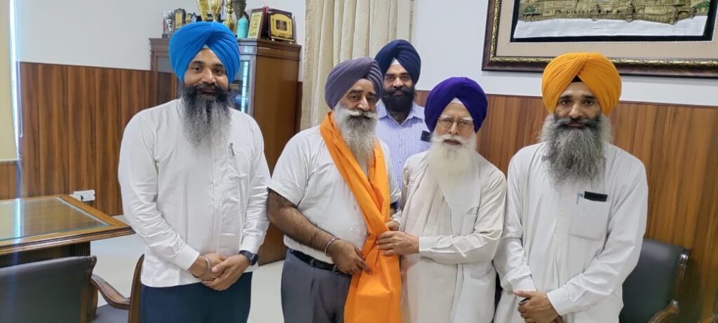 Prof. Kirpal Singh Badungar felicitates Prof. Pritpal Singh for his appointment as VC of Sri Guru Granth Sahib World University 