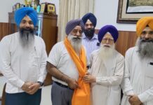 Prof. Kirpal Singh Badungar felicitates Prof. Pritpal Singh for his appointment as VC of Sri Guru Granth Sahib World University