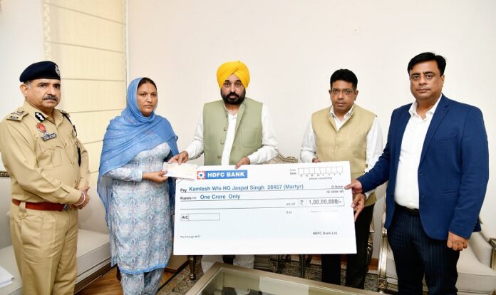 CM hands over cheque of insurance worth Rs 1 crore to family of martyred Home Guard Jawan Jaspal Singh