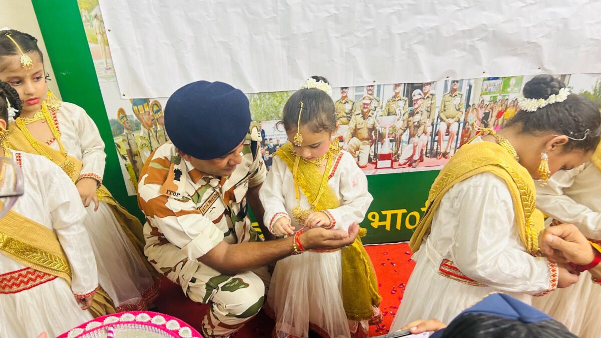 Gems Public School girls tie Rakhi on the wrists of ITBP officials