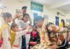 Gems Public School girls tie Rakhi on the wrists of ITBP officials