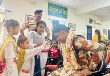 Gems Public School girls tie Rakhi on the wrists of ITBP officials